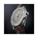 Tissot, Visodate with a 39mm stainless steel case and a brown alligator grained strap featuring a date function and a silver dial.