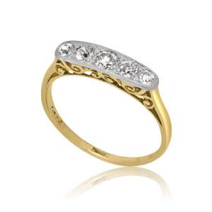 An early 20th century 18ct yellow gold and platinum five stone diamond ring.