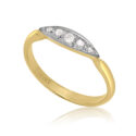 An early 20th century five stone diamond ring with brilliant cut and eight cut diamonds mounted in a platinum topped boat shaped millegrain setting.