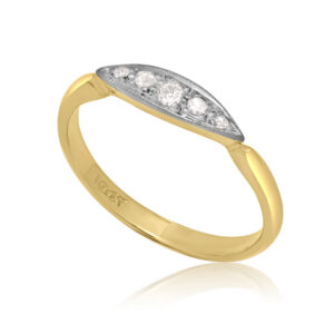An early 20th century five stone diamond ring with brilliant cut and eight cut diamonds mounted in a platinum topped boat shaped millegrain setting.