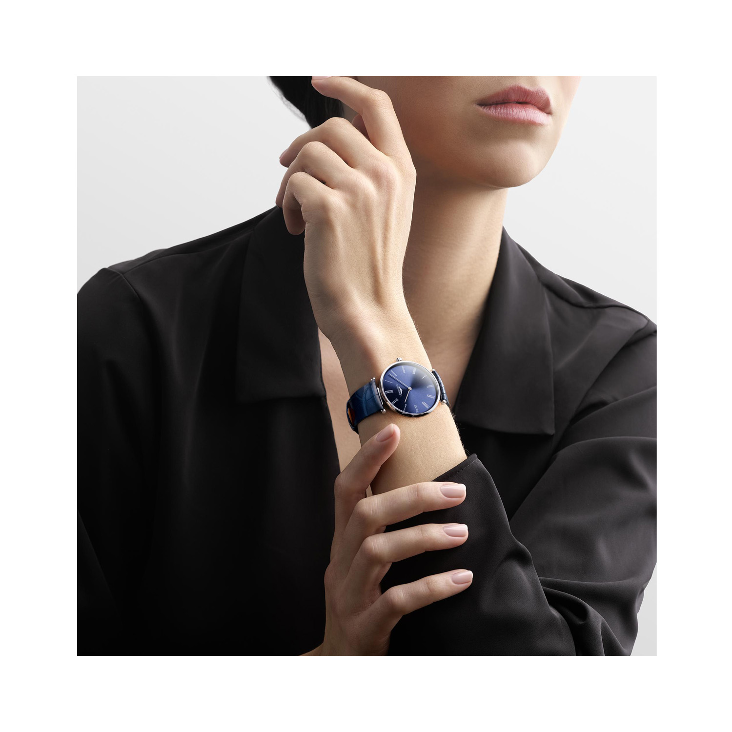 Longines, Le Grande Classique with a 38mm stainless steel case with a blue leather strap featuring a blue dial.