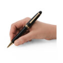 A Montblanc, Meisterstück Gold-Coated LeGrand Ballpoint pen in deep black precious resin with gold coated details featuring the white Montblanc star emblem.
