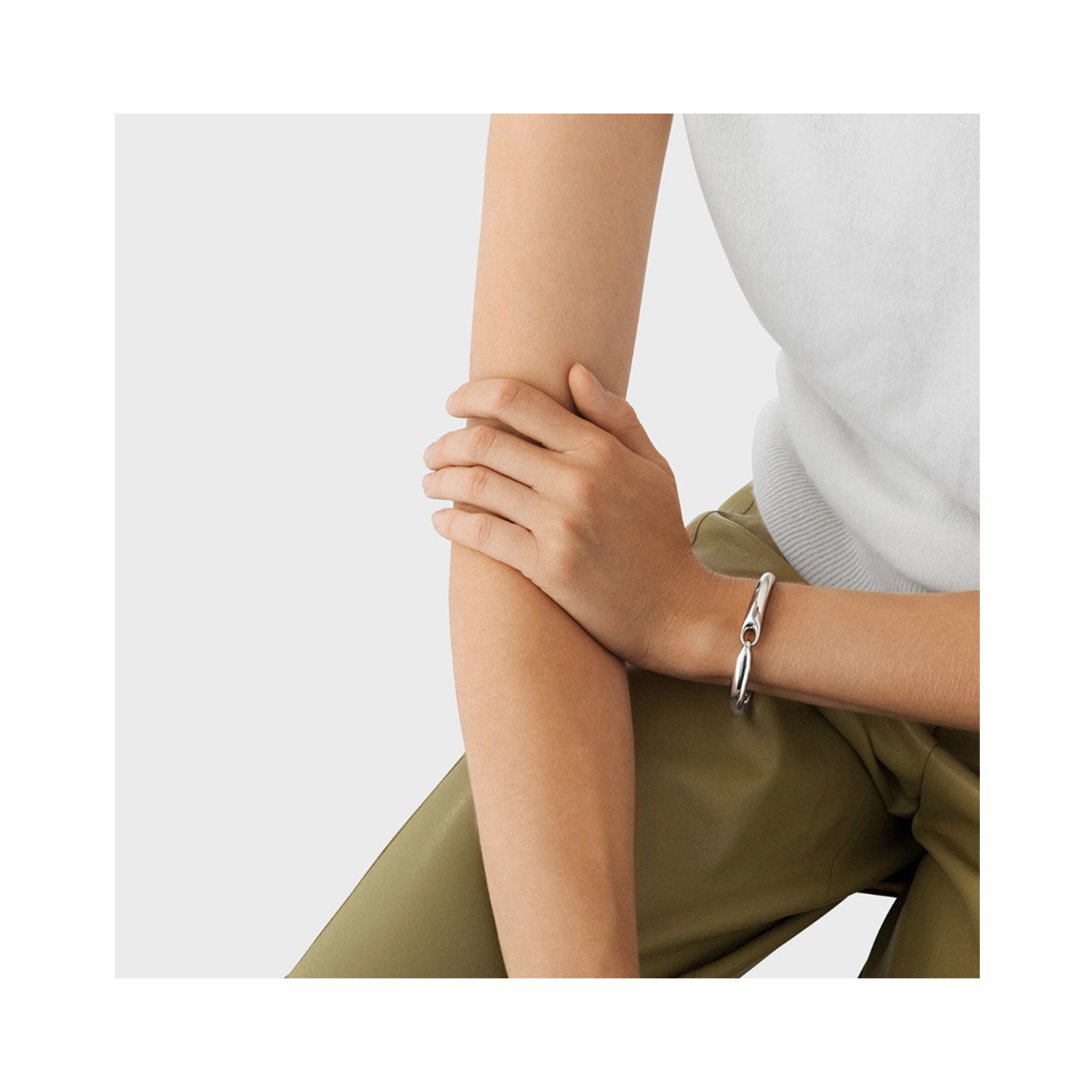 A medium sized, sterling silver hinged bangle from Georg Jensen's collection.