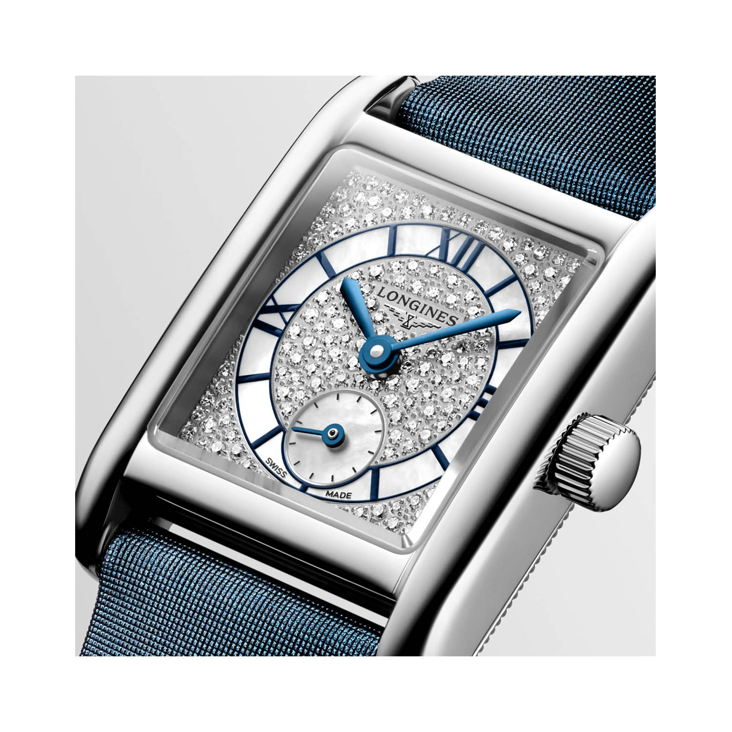 Longines, Mini DolceVita with a 21.5mm stainless steel case and a blue leather strap featuring a small seconds complication and a diamond 'snow set' mother of pearl dial.