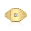A 9ct yellow gold oblong shaped signet ring set with a single diamond.
