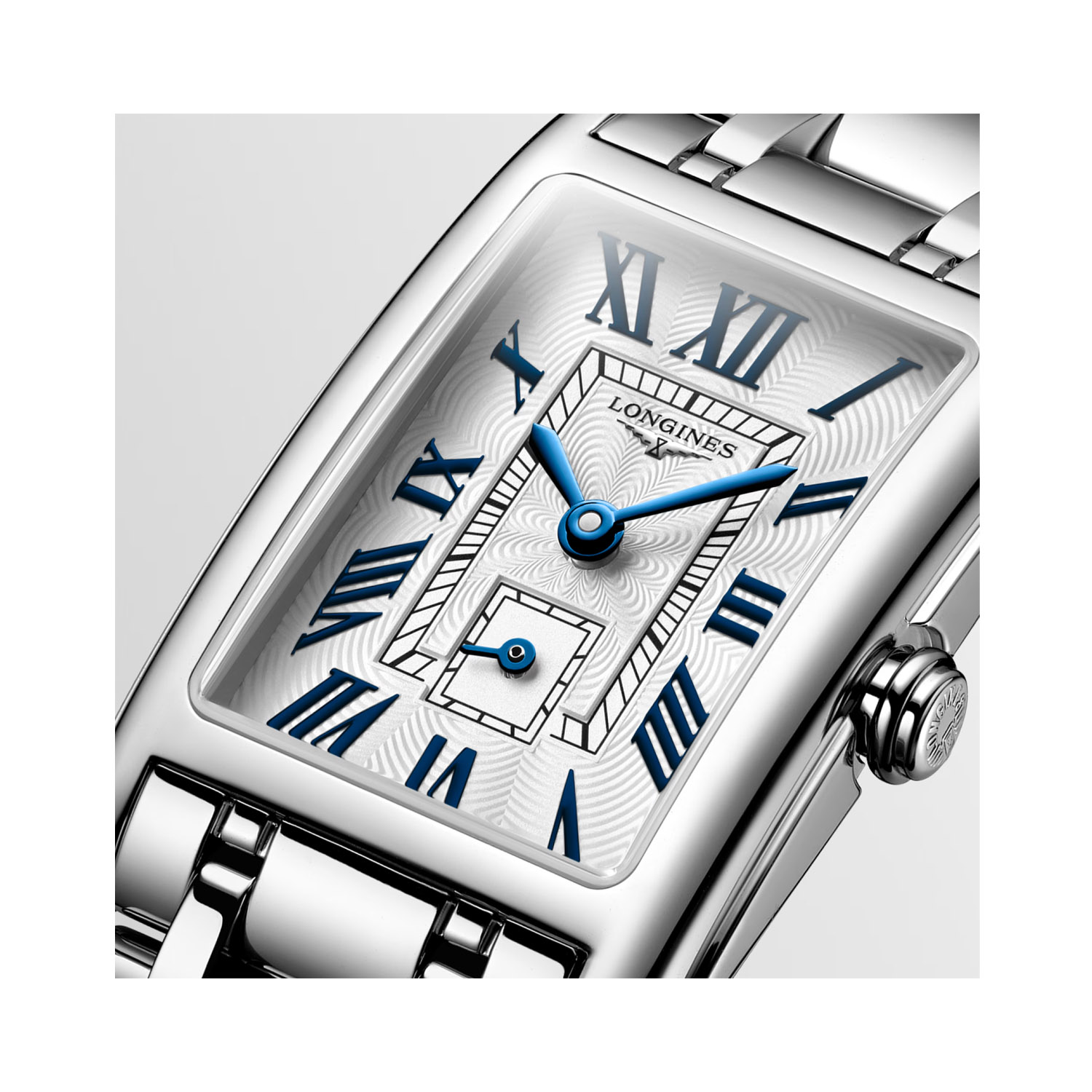 Longines, DolceVita Silver Roman Dial, Quartz Women's Watch Longines, DolceVita with a 20.80mm stainless steel case and bracelet strap featuring a small seconds hand on a silver "flinqué" dial.