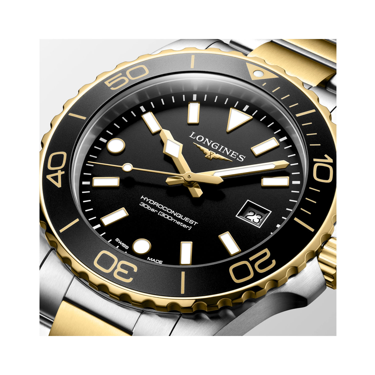 Longines, HydroConquest with a 42mm stainless steel and yellow gold PVD coated case and bracelet strap featuring a date function and a black dial and bezel.