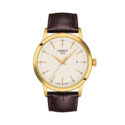 Tissot, Classic Dream Ivory Dial, Quartz Women's Watch Tissot, Classic Dream with a 42mm stainless steel yellow gold PVD coated case and a brown leather strap featuring a date function and an ivory coloured dial.