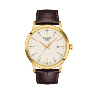Tissot, Classic Dream with a 42mm stainless steel yellow gold PVD coated case and a brown leather strap featuring a date function and an ivory coloured dial.