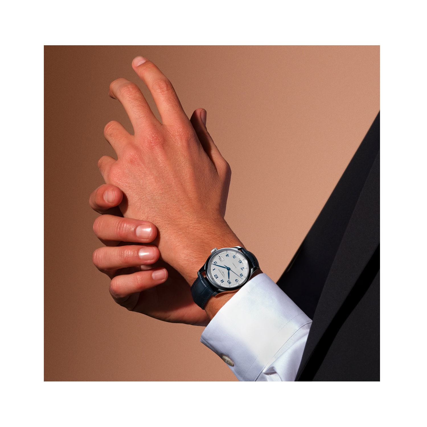 Longines, Master Collection with a 39mm stainless steel case and bracelet strap featuring a date function and a silver 'barleycorn' patterned dial.