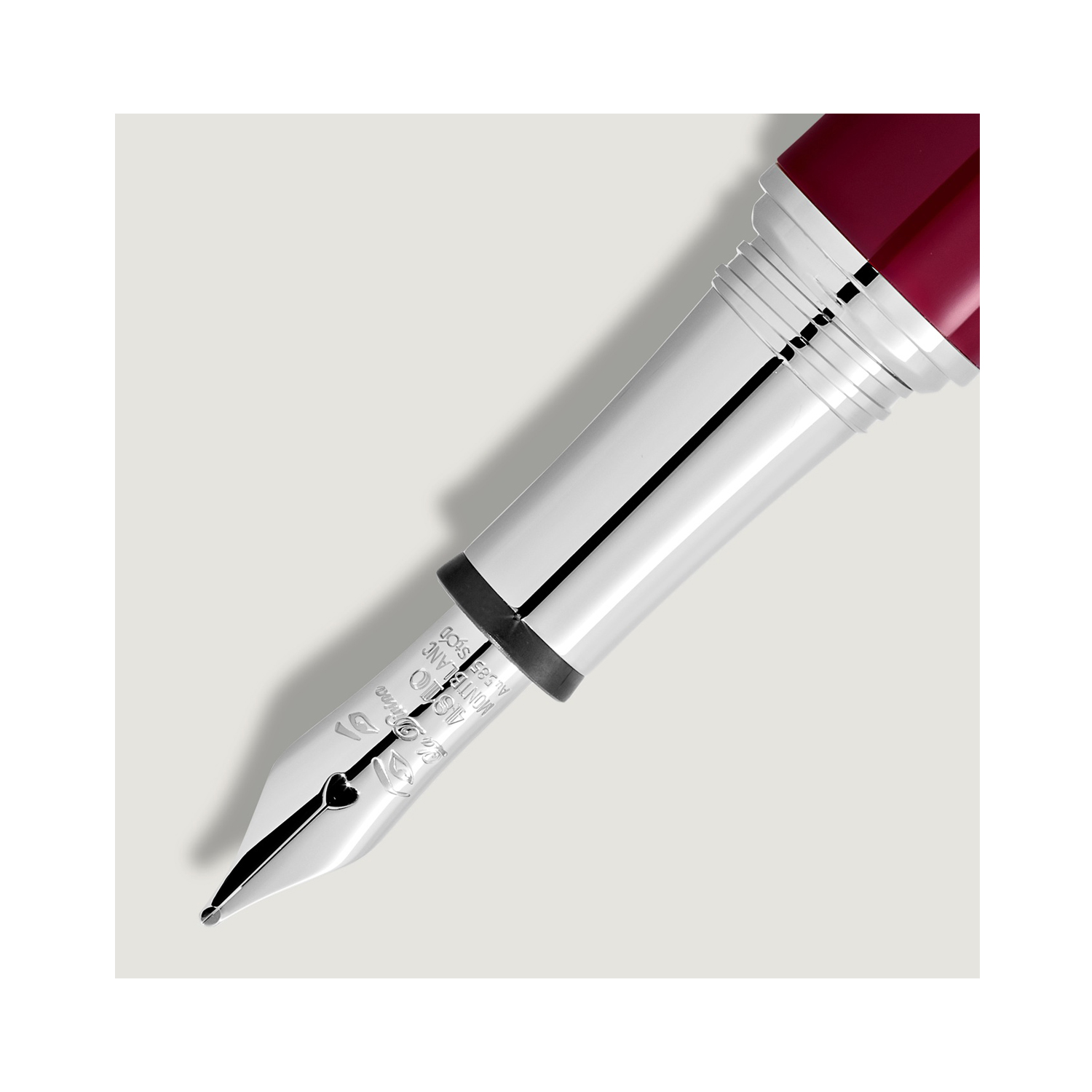 Montblanc, Muses Maria Callas Ruby Special Edition Fountain Pen A Montblanc, Muses Maria Callas Special Edition Fountain Pen crafted in ruby-coloured precious resin featuring a platinum coated clip with a handcrafted Au 585 solid gold, rhodium plated nib embossed with the kohl outlined cat eyes.