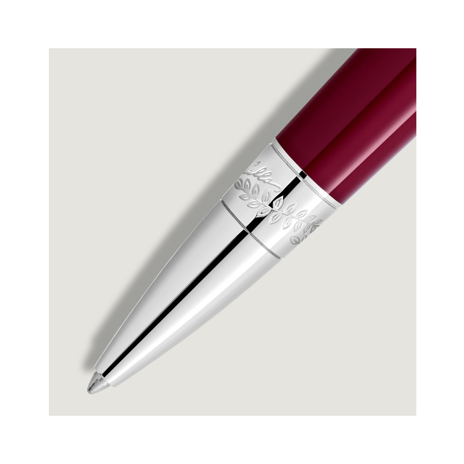 A Montblanc, Muses Maria Callas Special Edition Ballpoint pen crafted in ruby-coloured precious resin featuring a platinum coated clip.
