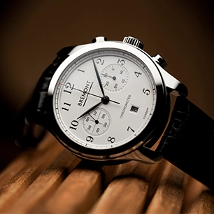 A Bremont watch with a white chronograph dial.