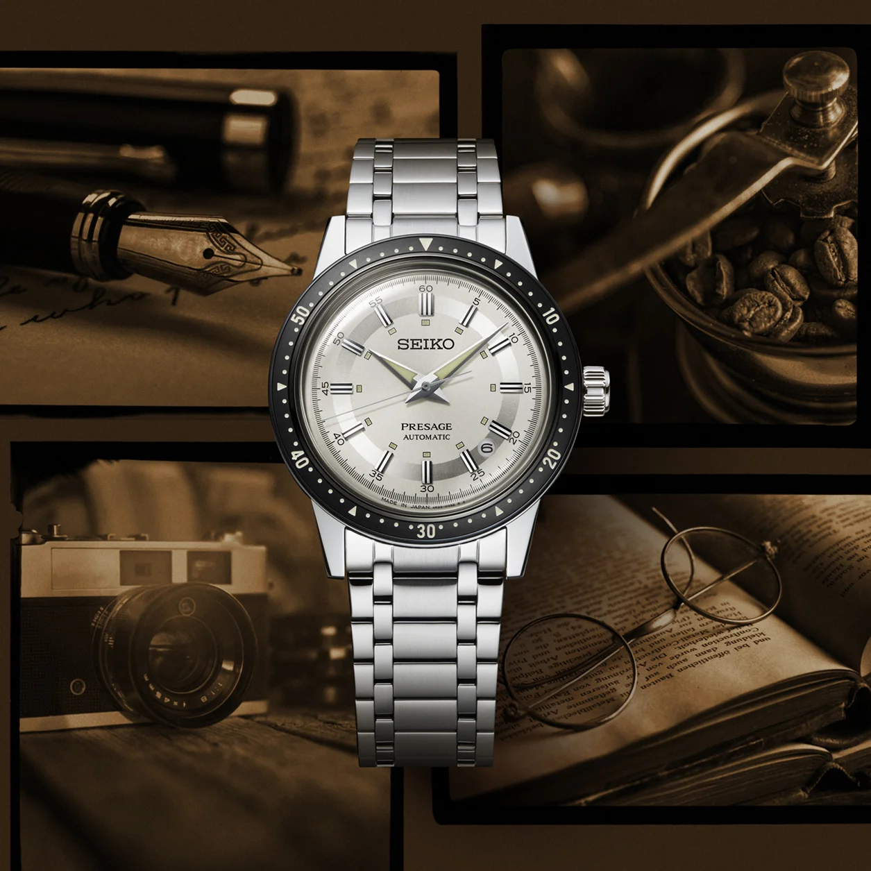 A Seiko watch with a stainless steel case and bracelet strap with a white dial and black bezel.
