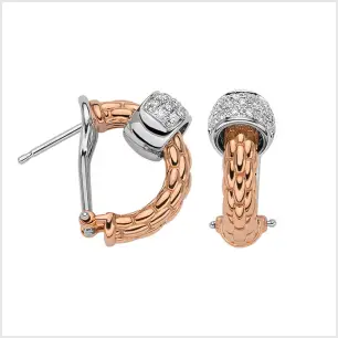 A pair of rose gold and white gold diamond set hoop earrings, for pierced ears.
