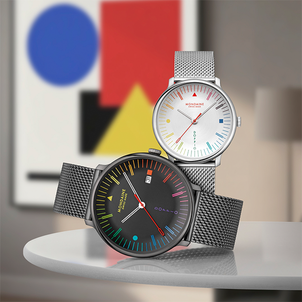 Two Mondaine Doppoi Bauhaus inspired watches, stainless steel and black.