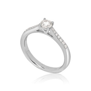Platinum single stone diamond ring with diamond set shoulders